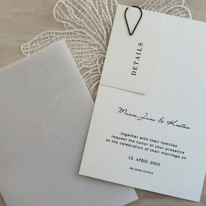 Invitation card with decorative paperclip