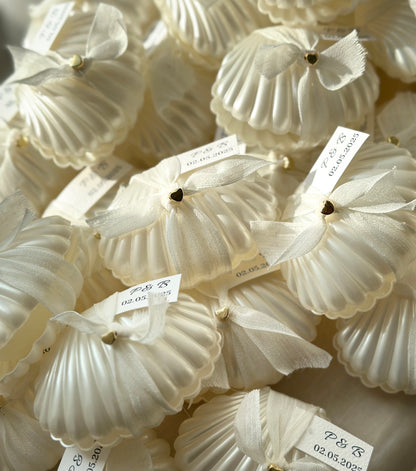 Shell candle favors